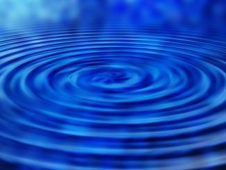 Water with ripples expanding outward